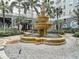 Exterior water feature, surrounding gravel, pavers, and greenery at 700 S Harbour Island Blvd # 143, Tampa, FL 33602
