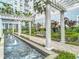 Exterior water feature with pergola, landscaping, and seating at 700 S Harbour Island Blvd # 143, Tampa, FL 33602