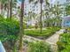 Exterior water feature in courtyard garden with pathways and greenery at 700 S Harbour Island Blvd # 143, Tampa, FL 33602