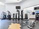 Bright gym featuring weight training equipment, free weights, weight machines, and wall-mounted TVs at 700 S Harbour Island Blvd # 143, Tampa, FL 33602
