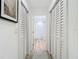 Hallway with white walls, closet doors, and a glimpse of a bathroom at 700 S Harbour Island Blvd # 143, Tampa, FL 33602