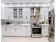 A modern kitchen features stainless steel appliances, stylish cabinetry, and light-colored wood floors at 700 S Harbour Island Blvd # 143, Tampa, FL 33602