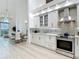 Bright kitchen features sleek stainless steel appliances, white cabinetry, and modern track lighting at 700 S Harbour Island Blvd # 143, Tampa, FL 33602