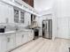 Well-lit kitchen featuring modern appliances, light-colored cabinets, and a neutral backsplash at 700 S Harbour Island Blvd # 143, Tampa, FL 33602