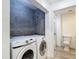 Laundry room area with tile accent wall, Samsung washer/dryer, and an adjacent toilet at 700 S Harbour Island Blvd # 143, Tampa, FL 33602