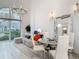 Living and dining area with modern chandelier, comfortable seating and large windows at 700 S Harbour Island Blvd # 143, Tampa, FL 33602