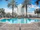 Resort style pool with mature palms and building views at 700 S Harbour Island Blvd # 143, Tampa, FL 33602