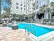 Bright blue community pool with convenient ladder access at 700 S Harbour Island Blvd # 143, Tampa, FL 33602
