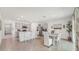 Bright, open-concept kitchen featuring stainless steel appliances at 7770 Wheat Stone Dr, Zephyrhills, FL 33540