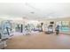 Well-equipped gym featuring treadmills, elliptical machines, weightlifting equipment, and mirrored walls at 7903 Seminole Blvd # 2204, Seminole, FL 33772