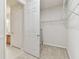 Walk-in closet adjacent to the bathroom with wire shelving, providing efficient storage at 7903 Seminole Blvd # 2204, Seminole, FL 33772