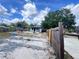 Image of the backyard featuring blue sky and a shade tree at 804 Whitehurst Rd, Plant City, FL 33563