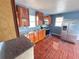 Spacious kitchen with ample cabinets, stainless steel appliances, and cherry-colored tile floors at 804 Whitehurst Rd, Plant City, FL 33563