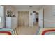 Bedroom features two twin beds, storage and a view of the hallway and other rooms at 829 Golf Island Dr, Apollo Beach, FL 33572