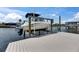 Private boat lift on a peaceful canal setting, great for boating enthusiasts, and easy water access at 829 Golf Island Dr, Apollo Beach, FL 33572