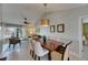 Cozy dining area open to living space, featuring modern furnishings and natural light at 829 Golf Island Dr, Apollo Beach, FL 33572