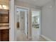 Inviting hallway with tile flooring leading to bedrooms and bathroom at 829 Golf Island Dr, Apollo Beach, FL 33572