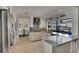 A pristine kitchen showcases granite countertops, stainless appliances, and an inviting view of the backyard at 829 Golf Island Dr, Apollo Beach, FL 33572