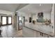 View of the kitchen featuring an island with stainless steel appliances and a decorative tile backsplash at 829 Golf Island Dr, Apollo Beach, FL 33572