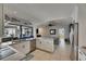 Modern kitchen with stainless steel appliances and open layout to the living area at 829 Golf Island Dr, Apollo Beach, FL 33572
