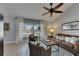 Comfortable living room with neutral walls, large window, and tile floors at 829 Golf Island Dr, Apollo Beach, FL 33572