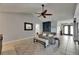 The living room features tile flooring and a comfortable seating area at 829 Golf Island Dr, Apollo Beach, FL 33572