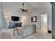 Comfortable living room area features a built-in wine bar and entertainment center at 829 Golf Island Dr, Apollo Beach, FL 33572