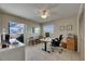 Bright office space with a ceiling fan, tile floors and a relaxing view of the lanai at 829 Golf Island Dr, Apollo Beach, FL 33572