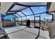 Waterfront outdoor space features hot tub, chairs, outdoor grill, and water views at 829 Golf Island Dr, Apollo Beach, FL 33572