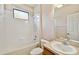 Clean and functional bathroom with tiled tub/shower and vanity sink at 8437 White Poplar Dr, Riverview, FL 33578