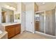 Beautiful bathroom featuring a walk-in shower, and double vanity at 8437 White Poplar Dr, Riverview, FL 33578