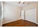 Inviting bedroom features hardwood floors and closet, ready for personalization at 8437 White Poplar Dr, Riverview, FL 33578