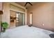 This patio features an open view to the backyard and a sliding door to the kitchen at 8437 White Poplar Dr, Riverview, FL 33578