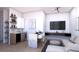 Modern living room featuring a bar area, sleek furniture, and a minimalist design creating a chic and comfortable space at 85 Davis Blvd # D, Tampa, FL 33606