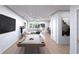Bright living room with a pool table and a view of an outside seating area at 85 Davis Blvd # D, Tampa, FL 33606