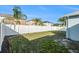 Spacious backyard with white fence providing privacy and plenty of space for recreation and gardening at 9954 N Jasmine Brook E Cir, Land O Lakes, FL 34638