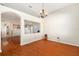 The dining room features hardwood floors and access to the kitchen at 9954 N Jasmine Brook E Cir, Land O Lakes, FL 34638