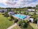 Aerial shot of community pool and surrounding lounge area at 110 W Cypress Ct, Oldsmar, FL 34677