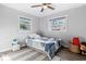 bedroom with two windows, ceiling fan, and decorative accents at 1543 Gentry St, Clearwater, FL 33755