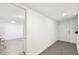 Finished basement featuring grey tile flooring, and an open floorplan at 166 E Davis Blvd, Tampa, FL 33606