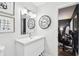 Bathroom featuring a single sink vanity and adjacent bedroom at 166 E Davis Blvd, Tampa, FL 33606