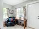 Inviting foyer area with an accent chair, and natural light at 2425 Auburn S St, St Petersburg, FL 33712