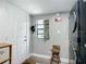 Functional laundry room features a washer and dryer, natural light, and storage space at 2425 Auburn S St, St Petersburg, FL 33712