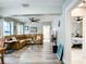 Open living room area with hardwood floors, neutral tones and great natural light at 2425 Auburn S St, St Petersburg, FL 33712