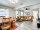 Inviting living room featuring a comfortable sectional sofa and hardwood flooring at 2425 Auburn S St, St Petersburg, FL 33712