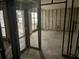 Unfinished basement with exposed metal framing and concrete floors, ready for customization at 253 Rex Pl # B, Madeira Beach, FL 33708
