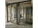 Unfinished basement reveals block walls and metal framing awaiting customization at 253 Rex Pl # B, Madeira Beach, FL 33708