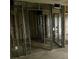 Unfinished basement shows metal framing and exposed block walls, ready for renovation at 253 Rex Pl # B, Madeira Beach, FL 33708