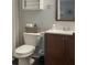 Cozy bathroom featuring a modern vanity, toilet, and coordinated decor at 253 Rex Pl # B, Madeira Beach, FL 33708