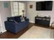 Cozy living room with natural light, stylish furniture, and decor at 253 Rex Pl # B, Madeira Beach, FL 33708